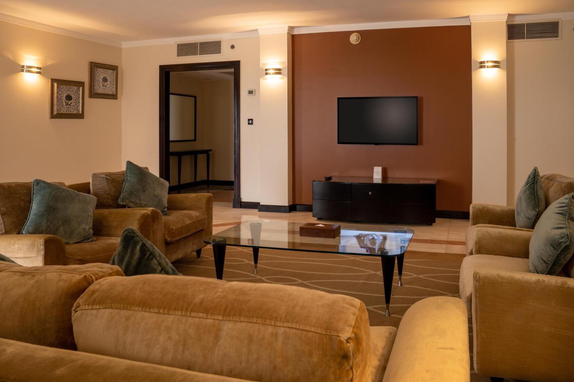 Danat Al Ain Resort Экстерьер фото A living room in a suite at the Taj Mahal Palace, Mumbai