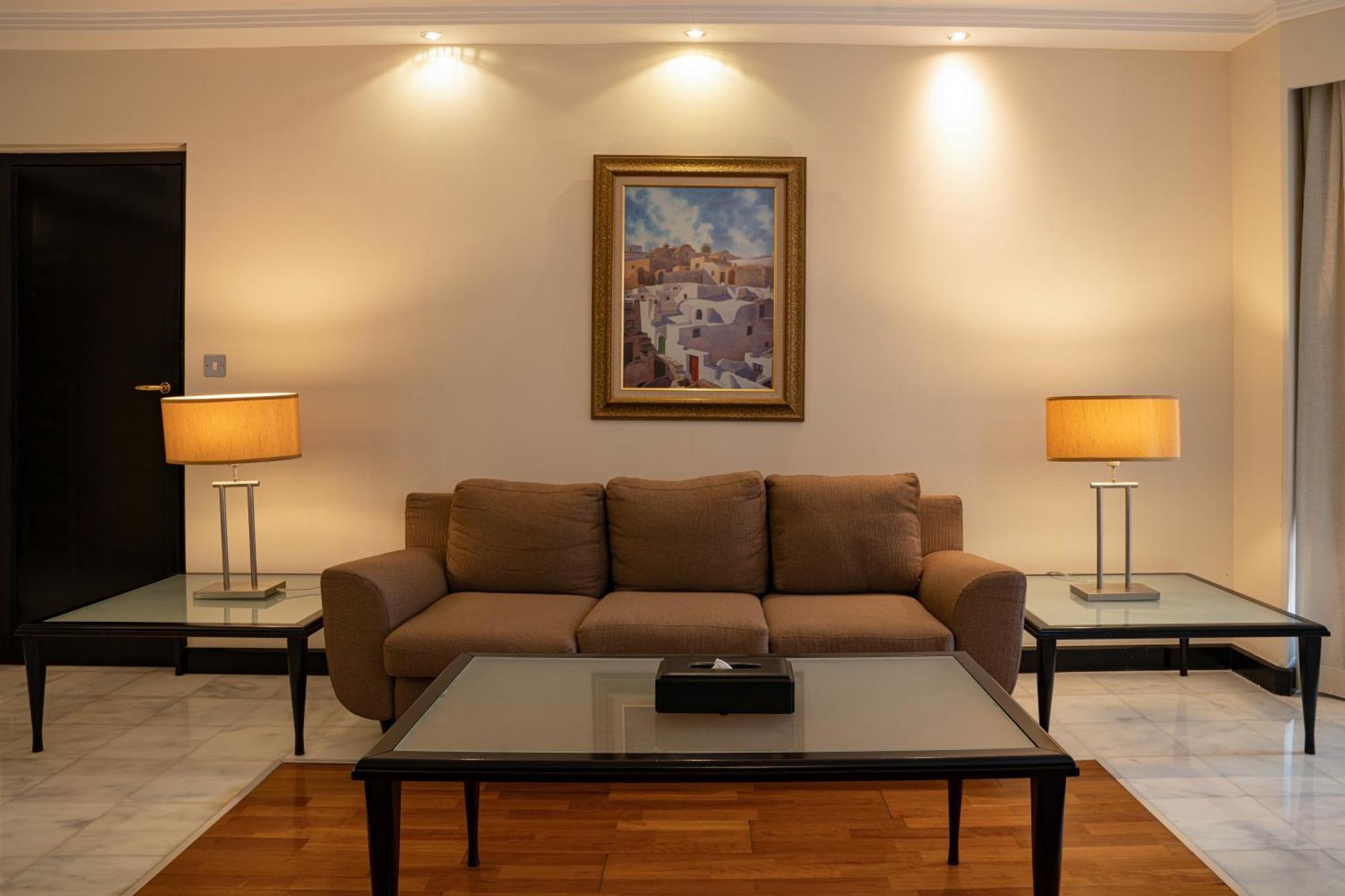 Danat Al Ain Resort Экстерьер фото A living room with a sofa