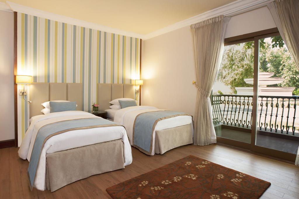 Danat Al Ain Resort Экстерьер фото A room at the hotel