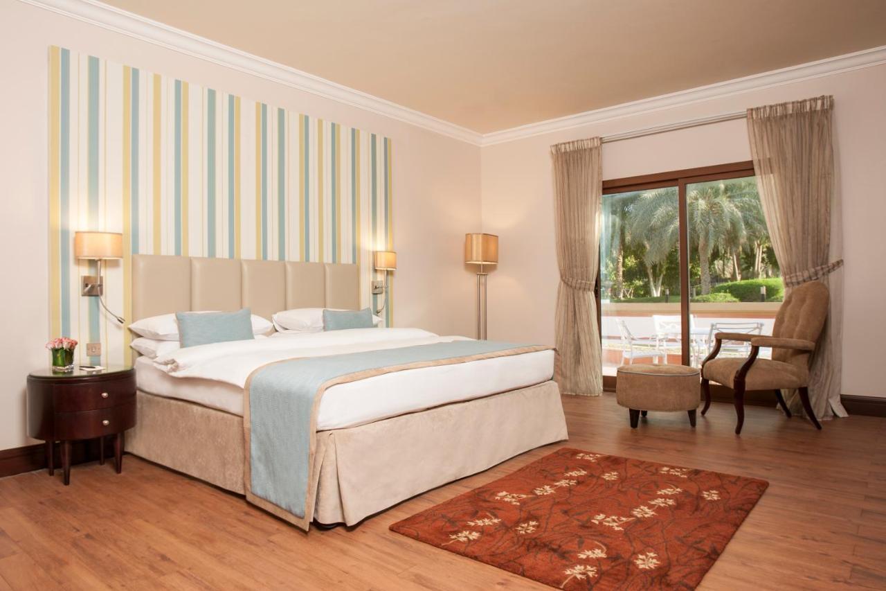 Danat Al Ain Resort Экстерьер фото A bedroom at the hotel